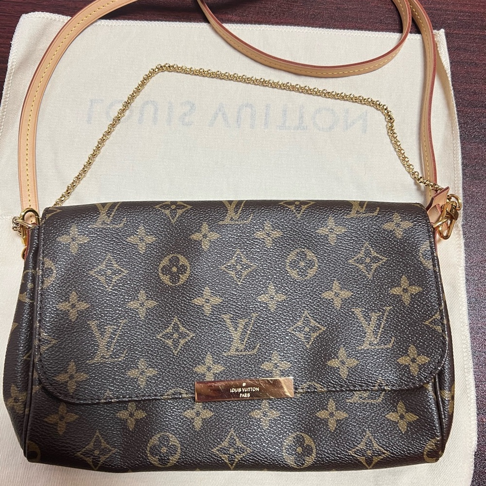 Louis Vuitton brown monogram pochette.